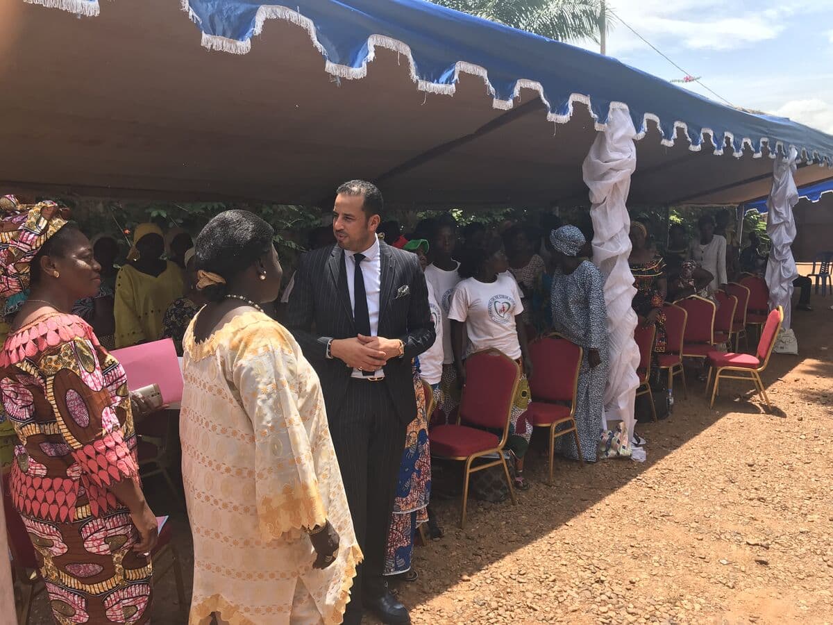 Kamal Benali greeting guests at an outdoor official ceremony in Bangui